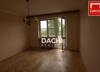 Prodej  bytu 3+1 s balkonem ve 2. NP domu s  garáží  v  obci Dolany u Olomouce.